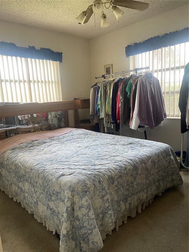 11753 SW 32nd St, Miami, FL 33175 - carpeted bedroom with multiple windows and ceiling fan