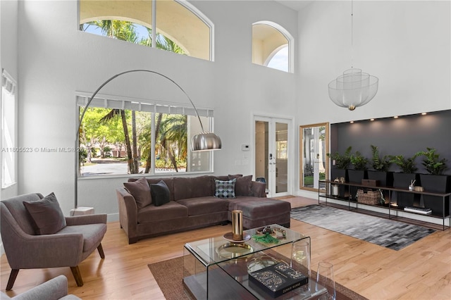 3905 Pinecrest Ct, Weston, FL 33331 - living area with wood finished floors, french doors, and a towering ceiling