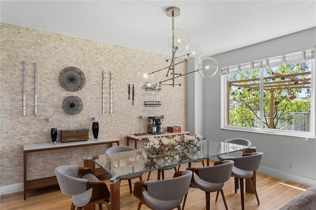 3905 Pinecrest Ct, Weston, FL 33331 - dining area featuring baseboards, wood finished floors, and a chandelier