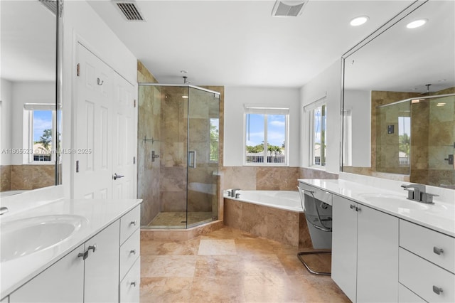 3905 Pinecrest Ct, Weston, FL 33331 - full bathroom featuring a shower stall, two vanities, a bath, and recessed lighting