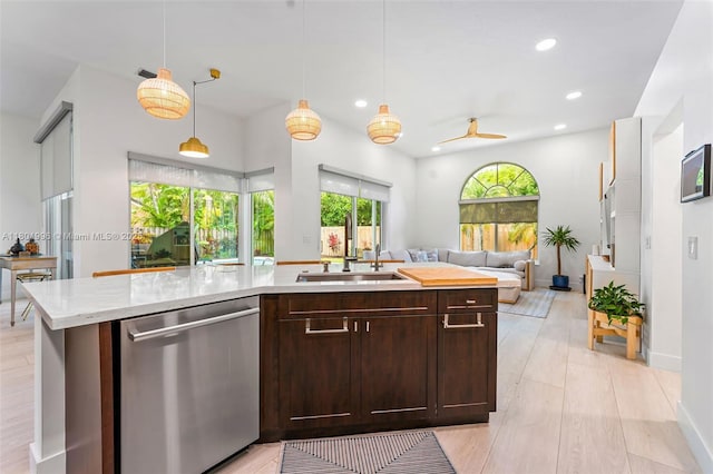 6121 Superior Blvd, Davie, FL 33331 - kitchen featuring dishwasher, a sink, open floor plan, recessed lighting, and dark brown cabinets