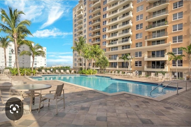 3232 SW 22nd Ter Unit 1003, Miami, FL 33145 - community pool with a patio area