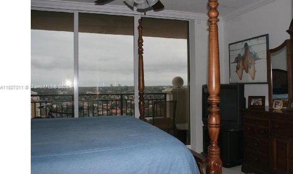 3232 SW 22nd Ter Unit 1003, Miami, FL 33145 - bedroom with ornamental molding