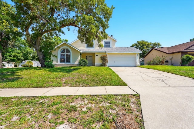 879 Matt Ln, Port Orange, FL 32127 - traditional-style home with concrete driveway, a front lawn, an attached garage, and stucco siding