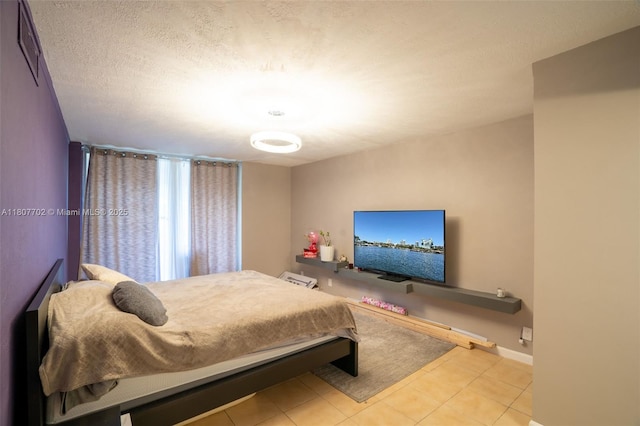 2101 Atlantic Shores Blvd Unit 120, Hallandale Beach, FL 33009 - tiled bedroom featuring baseboards