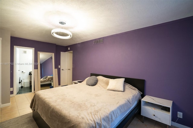 2101 Atlantic Shores Blvd Unit 120, Hallandale Beach, FL 33009 - bedroom featuring tile patterned flooring and baseboards
