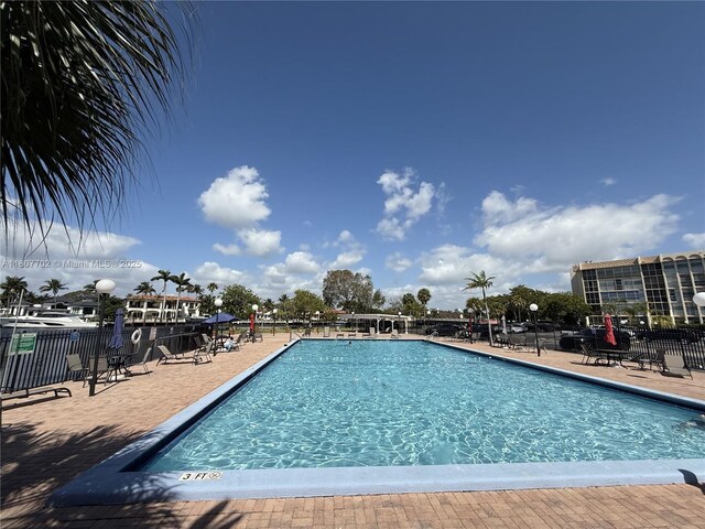 2101 Atlantic Shores Blvd Unit 120, Hallandale Beach, FL 33009 - community pool with a patio