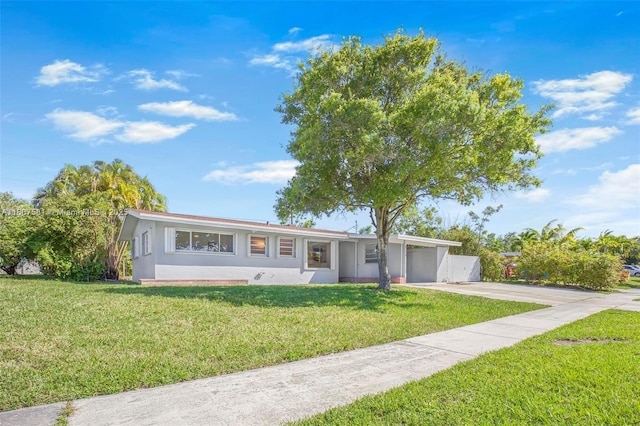 9710 Haitian Dr, Cutler Bay, FL 33189 - single story home featuring driveway, stucco siding, and a carport