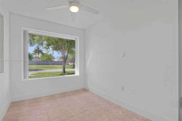 9710 Haitian Dr, Cutler Bay, FL 33189 - spare room featuring baseboards, light tile patterned floors, and ceiling fan