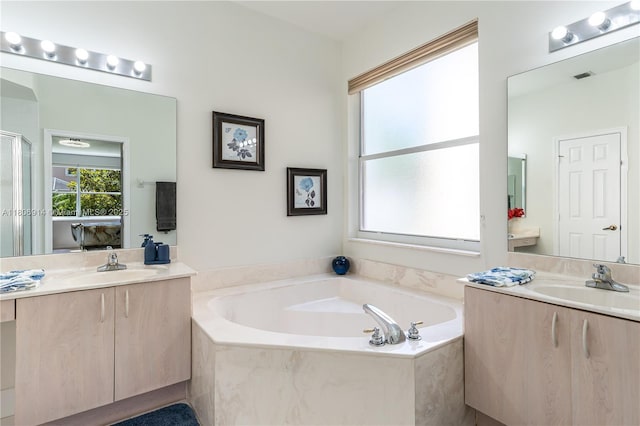 13366 NW 14th St, Pembroke Pines, FL 33028 - full bath with ensuite bath, two vanities, and a garden tub