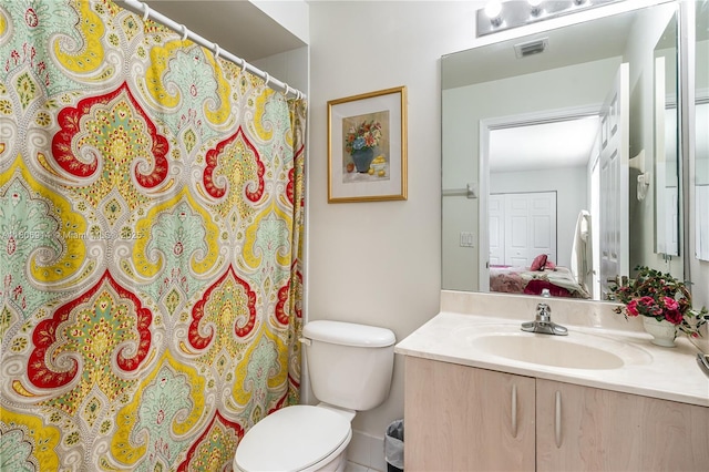 13366 NW 14th St, Pembroke Pines, FL 33028 - bathroom featuring toilet, ensuite bath, vanity, and a shower with shower curtain