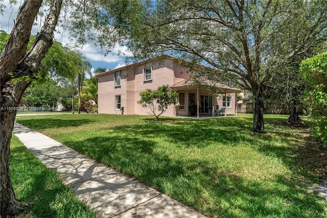 13366 NW 14th St, Pembroke Pines, FL 33028 - back of property featuring stucco siding and a patio