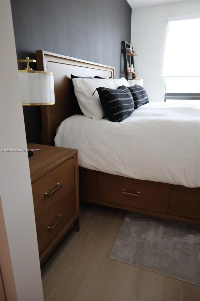 8201 NW 41st St Unit D-402, Doral, FL 33166 - bedroom featuring wood finished floors