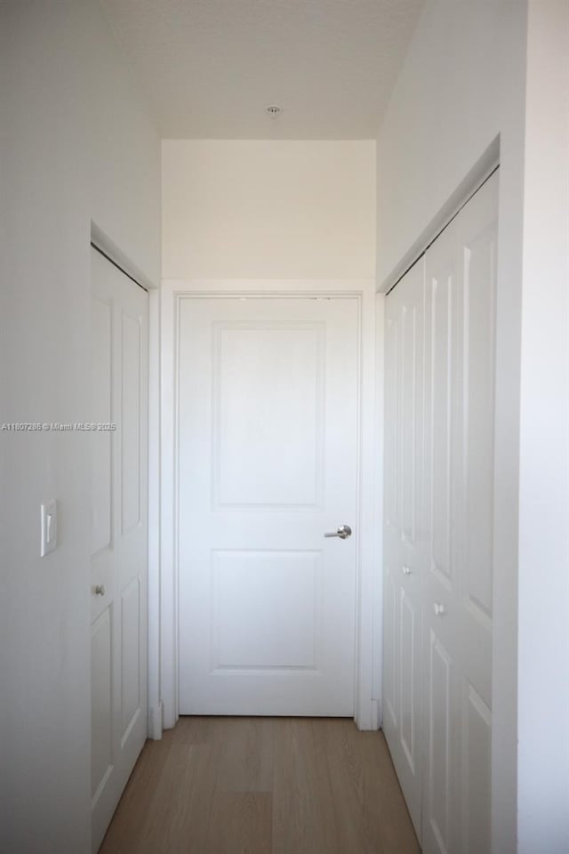 8201 NW 41st St Unit D-402, Doral, FL 33166 - hall with light wood finished floors