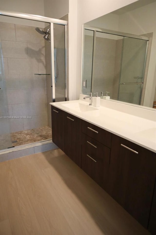 8201 NW 41st St Unit D-402, Doral, FL 33166 - full bathroom with a shower stall and double vanity