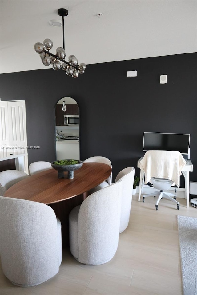 8201 NW 41st St Unit D-402, Doral, FL 33166 - dining area featuring arched walkways