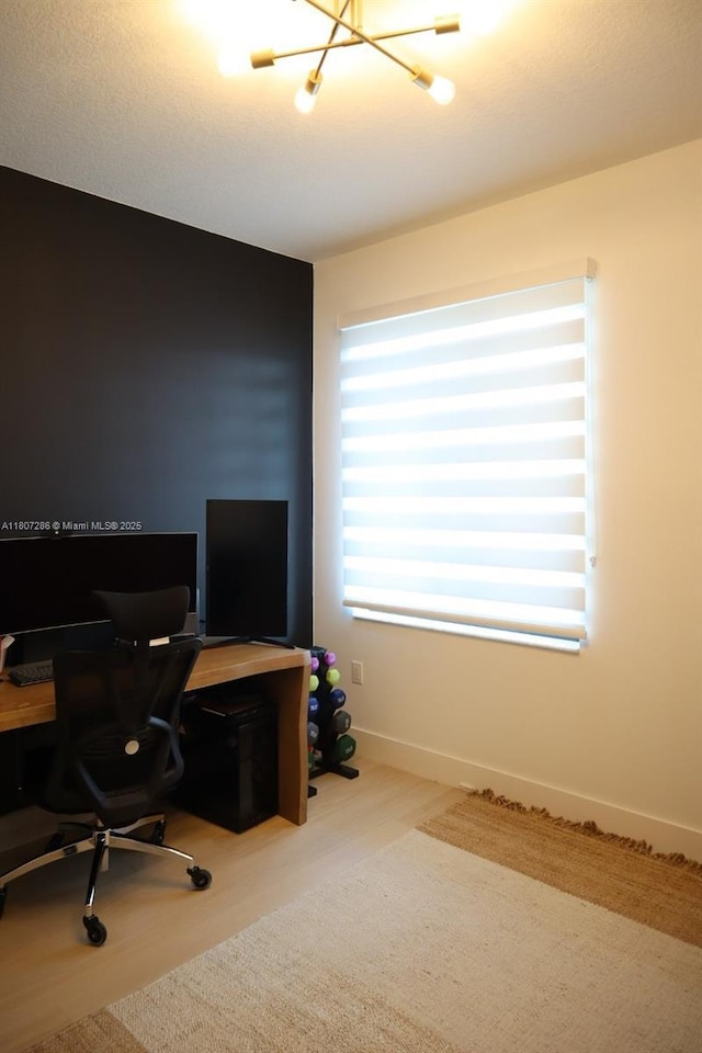8201 NW 41st St Unit D-402, Doral, FL 33166 - office space featuring baseboards, a chandelier, and wood finished floors