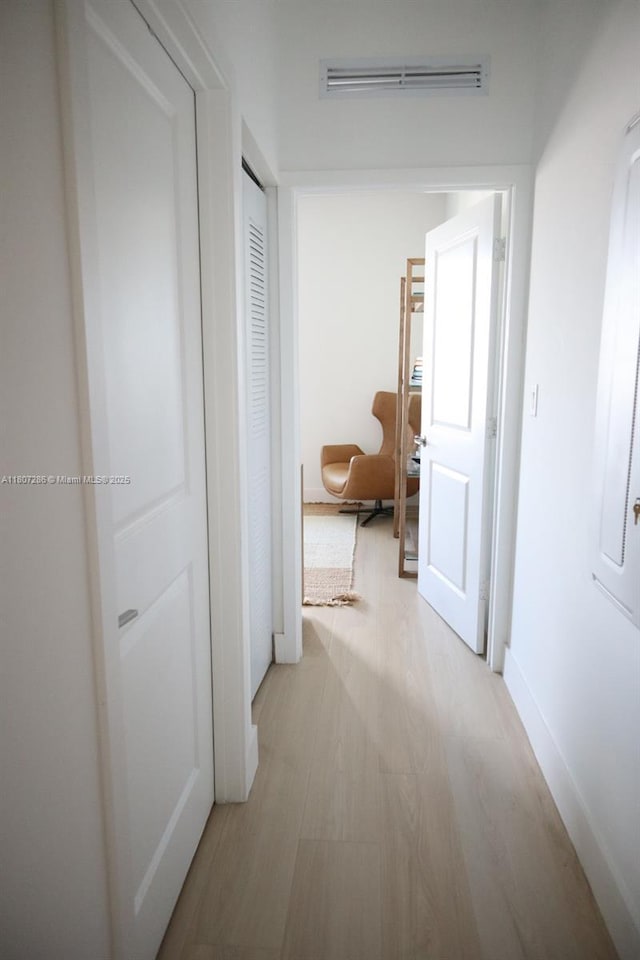 8201 NW 41st St Unit D-402, Doral, FL 33166 - hall featuring light wood-type flooring and baseboards