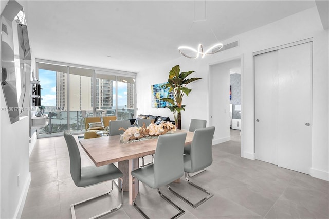 17550 Collins Ave Unit 603, Sunny Isles Beach, FL 33160 - dining space featuring baseboards