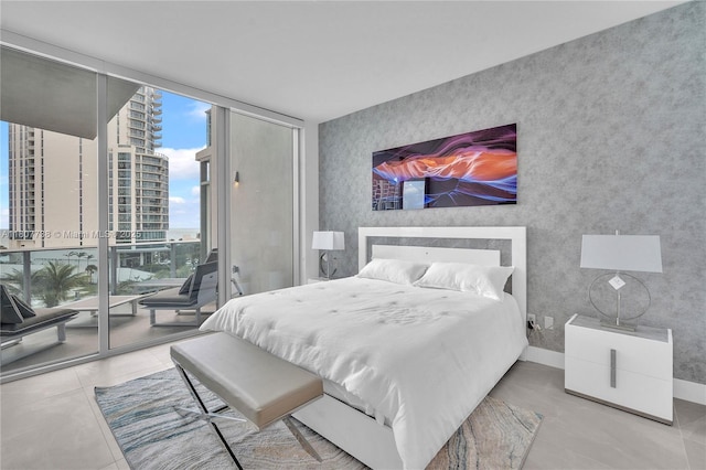 17550 Collins Ave Unit 603, Sunny Isles Beach, FL 33160 - tiled bedroom with expansive windows, access to exterior, and a view of city