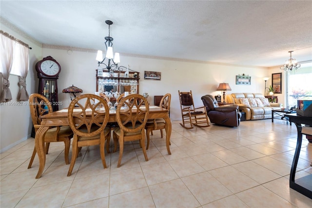 9823 S Hollybrook Lake Dr Unit 105, Pembroke Pines, FL 33025 - dining space with a chandelier, a textured ceiling, and light tile patterned floors