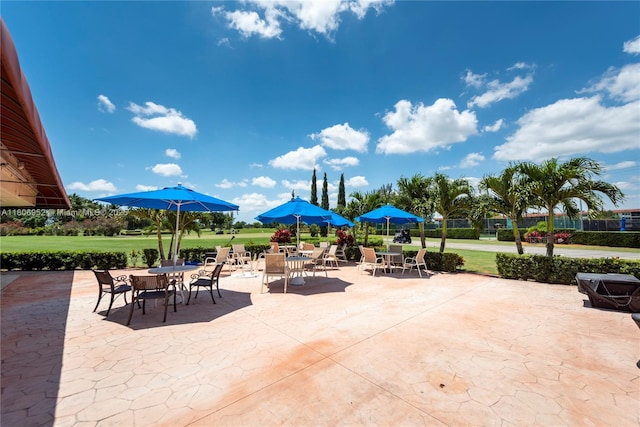 9823 S Hollybrook Lake Dr Unit 105, Pembroke Pines, FL 33025 - view of patio with outdoor dining space