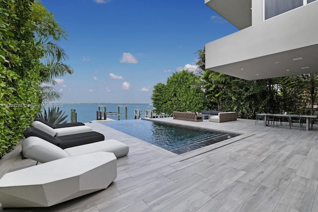 1379 N Venetian Way, Miami, FL 33139 - view of pool with an outdoor living space and a water view