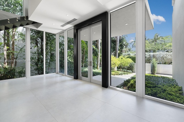 1379 N Venetian Way, Miami, FL 33139 - unfurnished sunroom featuring french doors