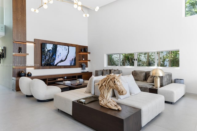 1379 N Venetian Way, Miami, FL 33139 - living area with a high ceiling and a chandelier