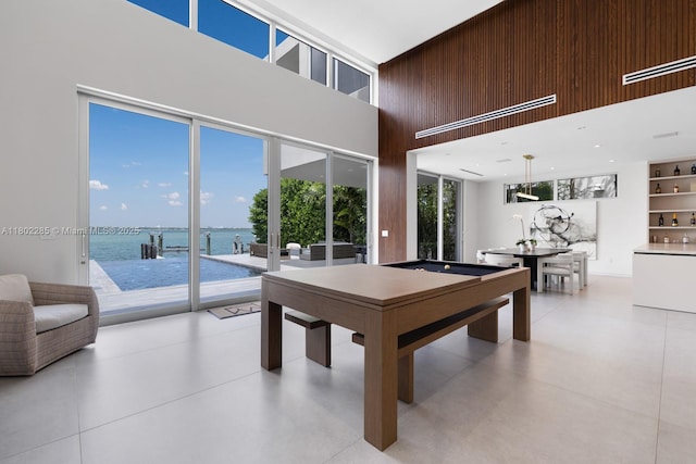 1379 N Venetian Way, Miami, FL 33139 - game room with a high ceiling, a water view, and pool table