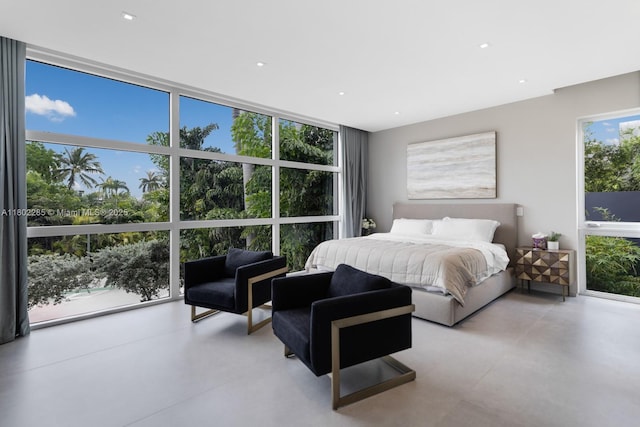 1379 N Venetian Way, Miami, FL 33139 - bedroom featuring finished concrete flooring, recessed lighting, and expansive windows