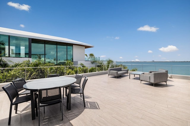 1379 N Venetian Way, Miami, FL 33139 - view of patio featuring an outdoor hangout area and a water view