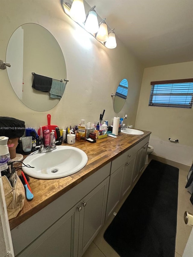 2301 NW 43rd Ter, Lauderhill, FL 33313 - bathroom with double vanity and toilet