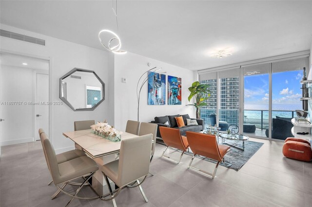 17550 Collins Ave Unit 704, Sunny Isles Beach, FL 33160 - dining room featuring floor to ceiling windows