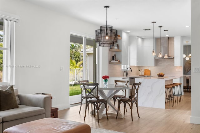 4017 W Gardenia Ave, Weston, FL 33332 - dining area featuring light wood-type flooring and recessed lighting