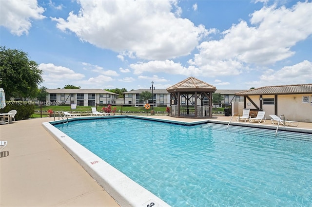 2391 NW 89th Dr Unit 409, Coral Springs, FL 33065 - community pool featuring a gazebo