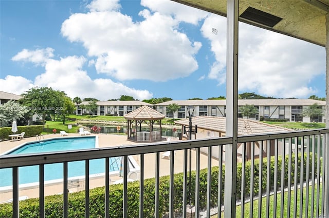 2391 NW 89th Dr Unit 409, Coral Springs, FL 33065 - community pool featuring a gazebo and a residential view