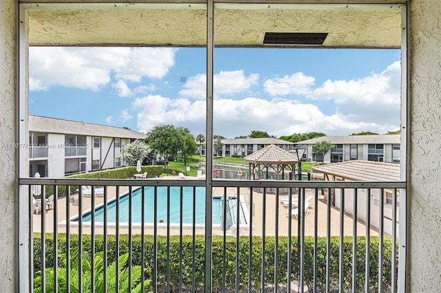 2391 NW 89th Dr Unit 409, Coral Springs, FL 33065 - community pool with a gazebo and a residential view
