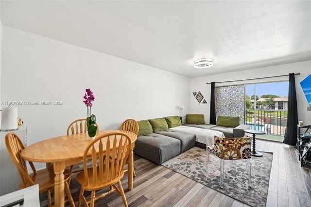2391 NW 89th Dr Unit 409, Coral Springs, FL 33065 - living room featuring wood finished floors