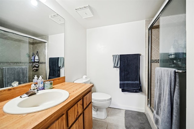 2391 NW 89th Dr Unit 409, Coral Springs, FL 33065 - bathroom featuring a shower stall, tile patterned floors, vanity, toilet, and baseboards