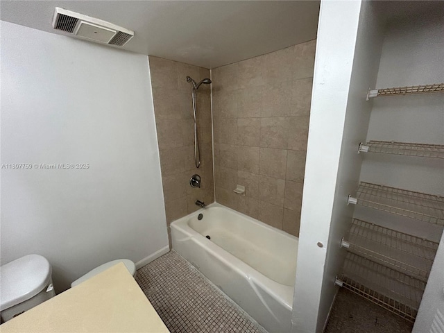 4222 Inverrary Blvd Unit 4211, Lauderhill, FL 33319 - full bathroom featuring toilet, tub / shower combination, tile patterned floors, and baseboards