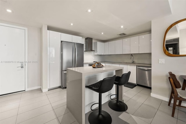 1600 NE 1st Ave Unit 2907, Miami, FL 33132 - kitchen with appliances with stainless steel finishes, wall chimney range hood, modern cabinets, white cabinets, and recessed lighting