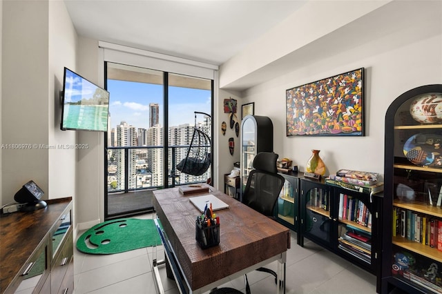 1600 NE 1st Ave Unit 2907, Miami, FL 33132 - office area featuring tile patterned floors, expansive windows, and arched walkways