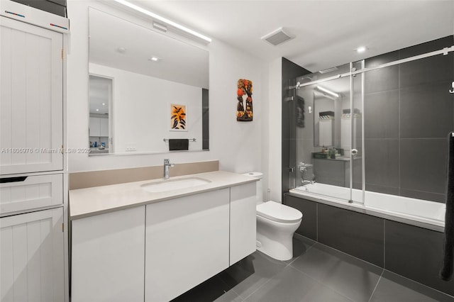 1600 NE 1st Ave Unit 2907, Miami, FL 33132 - bathroom featuring toilet, tile patterned flooring, enclosed tub / shower combo, and vanity