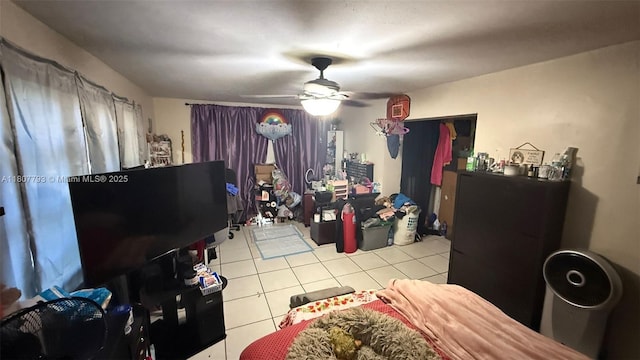 1230 NW 113th Ter, Miami, FL 33167 - tiled bedroom with ceiling fan