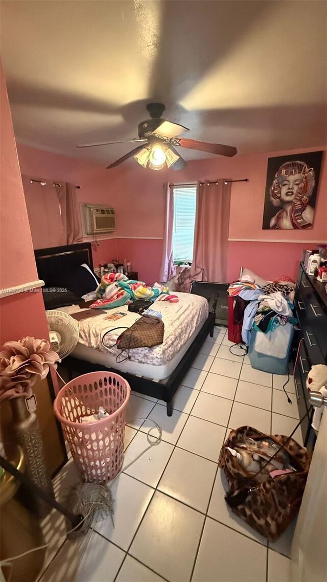 1230 NW 113th Ter, Miami, FL 33167 - bedroom featuring tile patterned floors, ceiling fan, and a wall unit AC