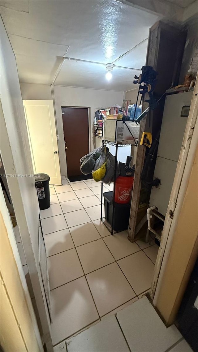 1230 NW 113th Ter, Miami, FL 33167 - corridor with light tile patterned flooring