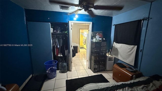 1230 NW 113th Ter, Miami, FL 33167 - bedroom featuring light tile patterned floors and ceiling fan
