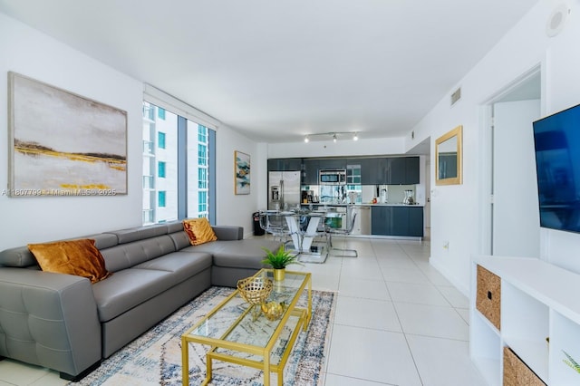 31 SE 6th St Unit 2408, Miami, FL 33131 - living area with light tile patterned floors and track lighting