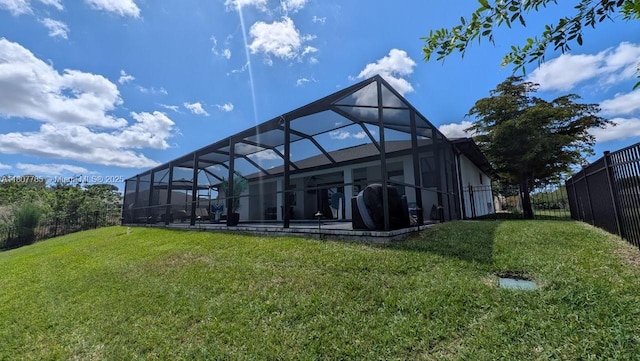 311 SE 14th St, Cape Coral, FL 33990 - rear view of house with glass enclosure